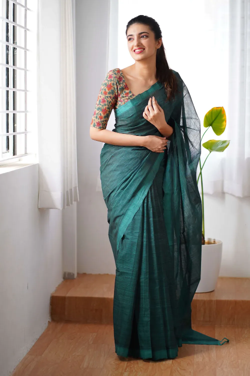 demanding dark green traditional looking chanderi cotton saree